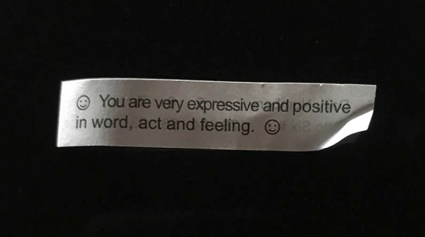 Fortune cookie fortune, that reads, 'You are very expressive and positive in word, act and feeling.'