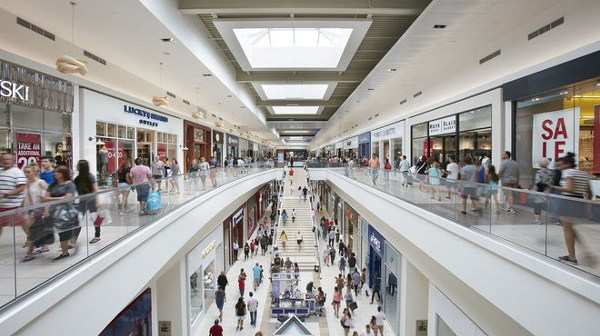 Image of a crowded shopping mall. Image credit: GIS