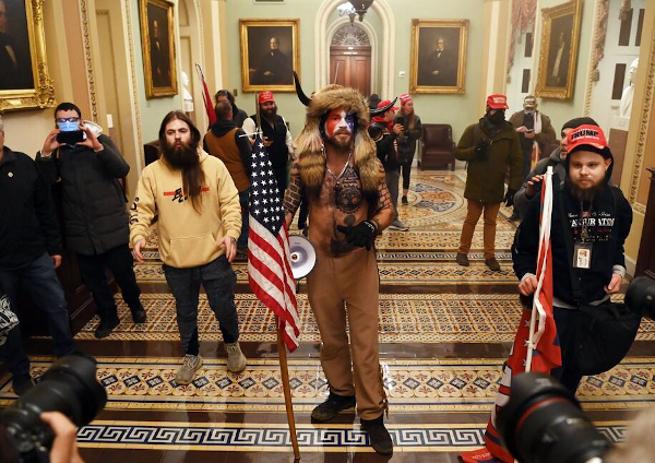 Seditionists inside the Capitol building on January 6th